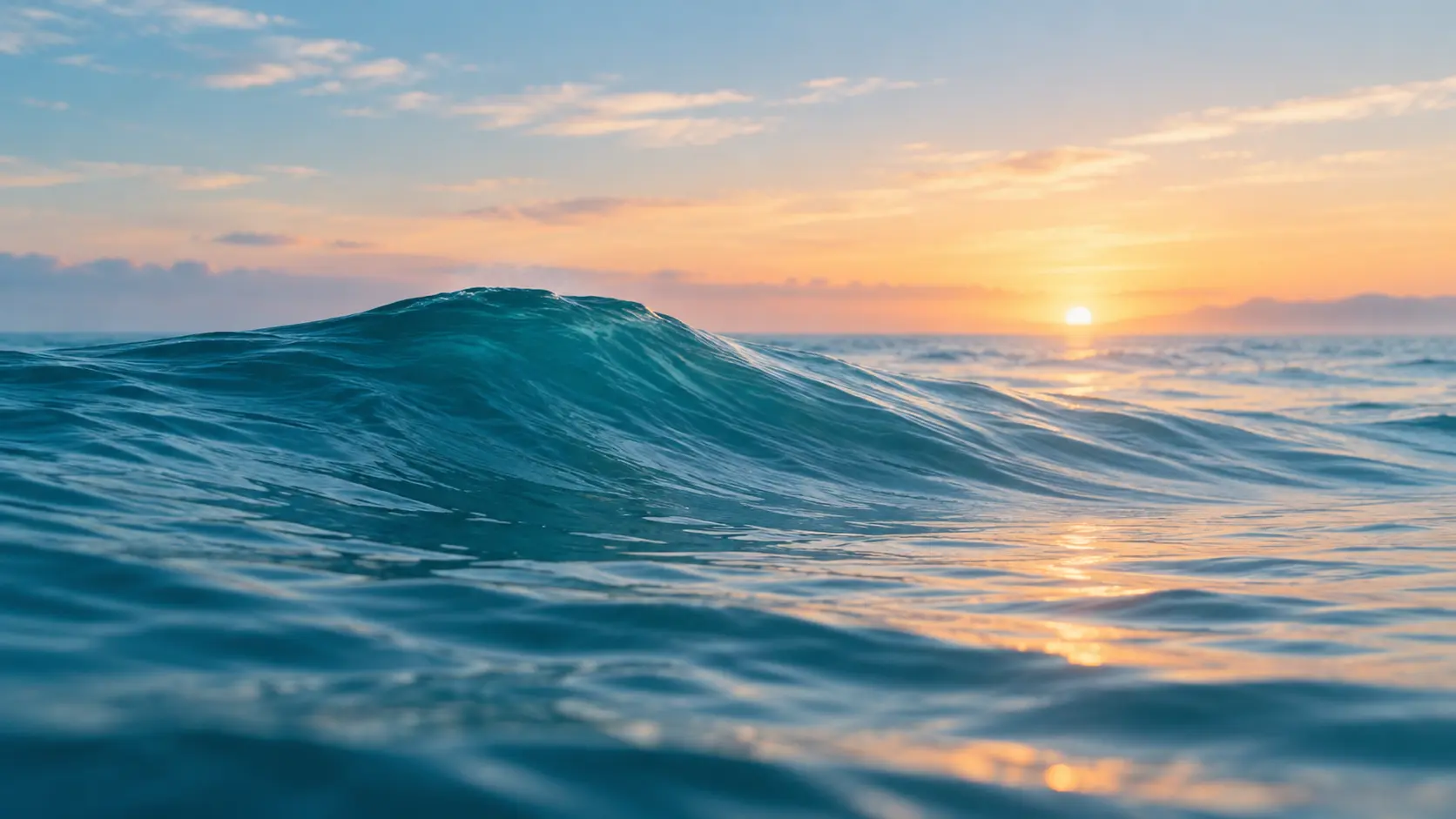 Ocean wave cresting and falling at dawn, a metaphor for a passing craving